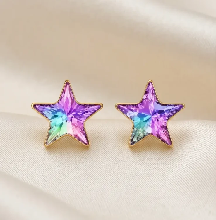 Romantyczne pozłacane kolczyki damskie z motywem gwiazdki i kryształami Swarovski® Vitrail Light.