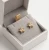 Minimalistyczne kolczyki gwiazdki z kryształami Swarovski® Golden Shadow, elegancka biżuteria dla kobiet.