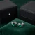 Platynowane kolczyki damskie ze srebra 925 z kryształami Emerald.