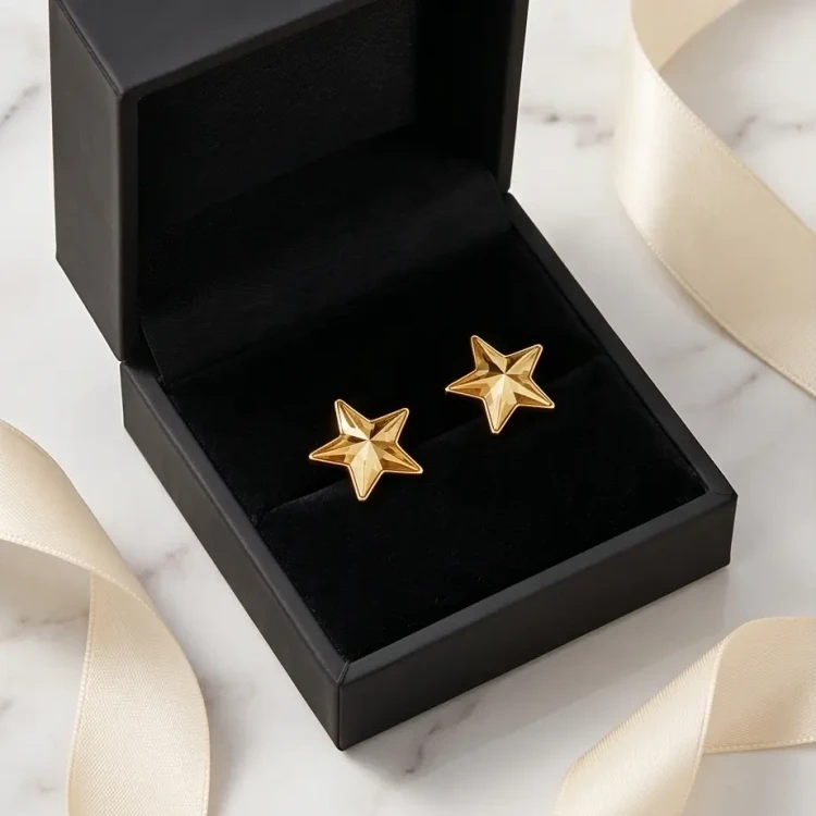 Nowoczesne kolczyki gwiazdki z kryształami Swarovski® Aurum i eleganckim złotym połyskiem