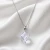 Damski naszyjnik srebrny z białą kostką Swarovski®