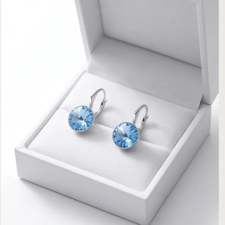 Srebrne kolczyki z okrągłymi kryształami Swarovski® Aquamarine o świeżym błękitnym blasku