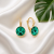 Pozłacane kolczyki srebrne z kryształami Swarovski® Majestic Green 8 mm