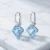 Eleganckie srebrne kolczyki z lśniącymi kostkami Swarovski® 8 mm Aquamarine