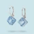 Srebrne kolczyki z kostkami Swarovski® Aquamarine w akwamarynowym odcieniu