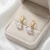 Eleganckie pozłacane kolczyki z lśniącymi kostkami Swarovski® 8 mm