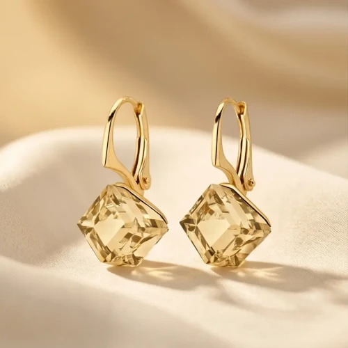 Pozłacane kolczyki z kryształami Swarovski® w kształcie kostek Golden Shadow