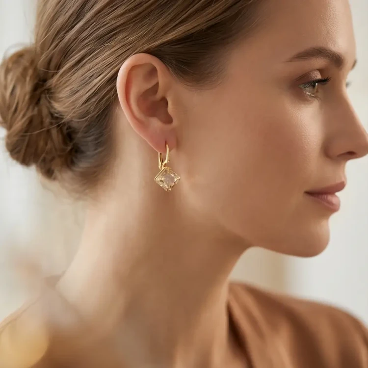 Damskie kolczyki srebrne pozłacane z kryształowymi kostkami Swarovski® 8 mm