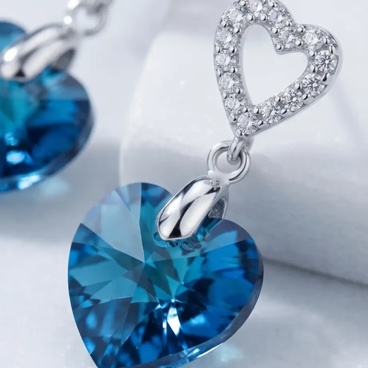 Damskie kolczyki srebrne z niebieskimi kryształami Swarovski® serce