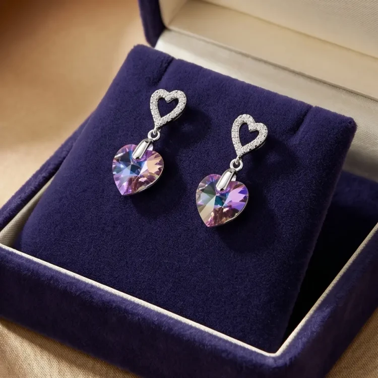Delikatne kolczyki damskie z kryształami Swarovski® serca o różowo-fioletowych refleksach
