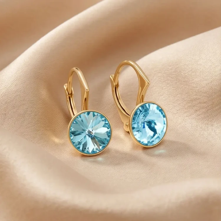 Kolczyki srebrne pozłacane z błękitnymi kryształami Swarovski® Light Turquoise