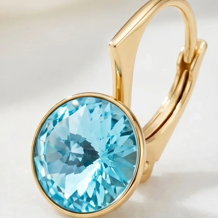 Pozłacane kolczyki z okrągłym kryształem Swarovski® w kolorze Light Turquoise