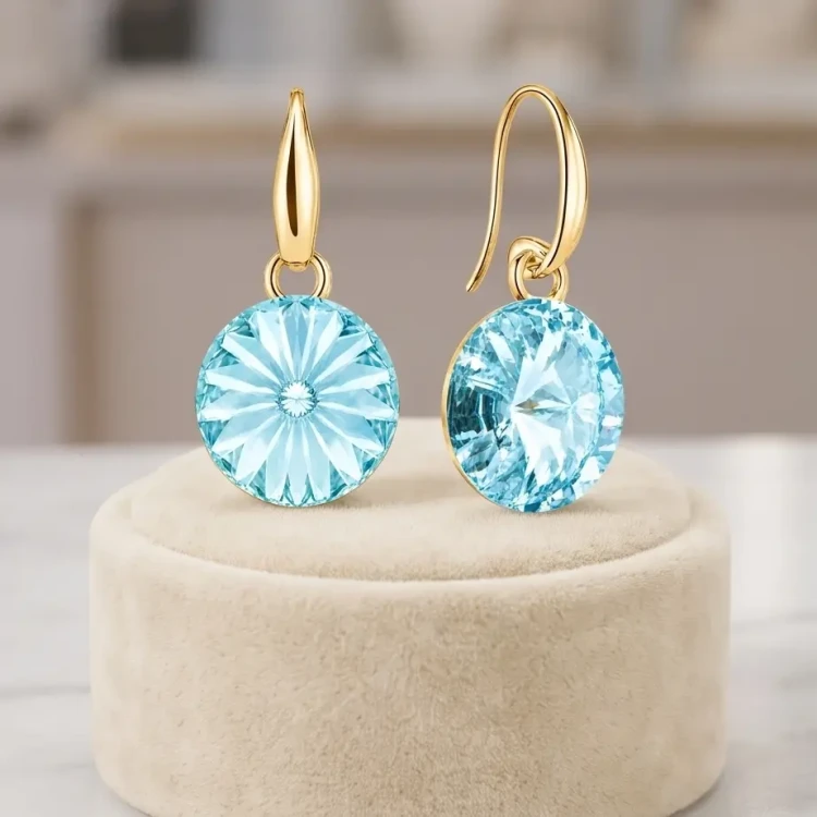 Damskie kolczyki srebrne pozłacane z błękitnymi kryształami Swarovski® 10 mm