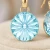 Wiszące kolczyki z pozłacanego srebra z kryształami Swarovski® Light Turquoise