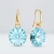 Eleganckie kolczyki pozłacane z kryształami Swarovski® w kolorze Light Turquoise