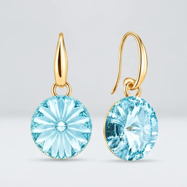 Eleganckie kolczyki pozłacane z kryształami Swarovski® w kolorze Light Turquoise