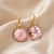 Wiszące kolczyki z pozłacanego srebra z różowymi kryształami Swarovski® 10 mm