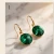 Damskie kolczyki srebrne pozłacane z zielonymi kryształami Swarovski® 10 mm