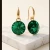 Wiszące kolczyki z pozłacanego srebra z kryształami Swarovski® Majestic Green