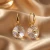 Damskie kolczyki srebrne pozłacane z przezroczystymi kryształami Swarovski®