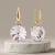 Eleganckie kolczyki pozłacane z bezbarwnymi kryształami Swarovski® 10 mm