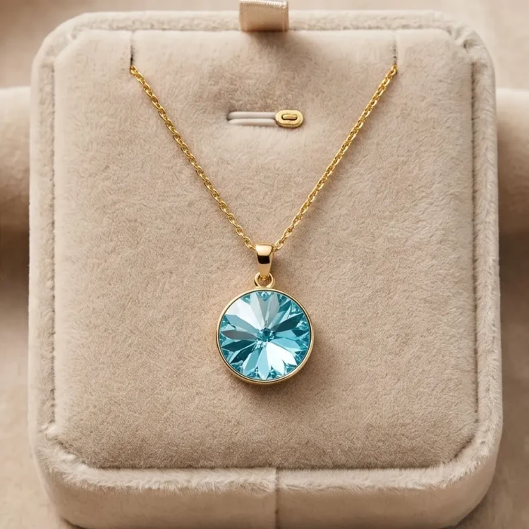 Elegancki pozłacany naszyjnik z kryształem Swarovski® 12 mm w kolorze Light Turquoise