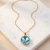 Srebrny naszyjnik pozłacany z dużym okrągłym kryształem Swarovski® Light Turquoise