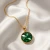 Damski naszyjnik srebrny pozłacany z zielonym kryształem Swarovski®