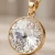 Elegancki pozłacany naszyjnik z bezbarwnym kryształem Swarovski® 12 mm