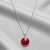 Damski naszyjnik srebrny z czerwonym kryształem Swarovski®