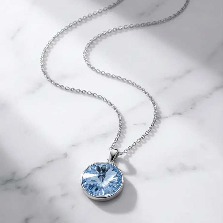 Srebrny naszyjnik z dużym okrągłym kryształem Swarovski® 12 mm w jasnoszafirowym kolorze