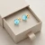 Kolczyki na sztyft z pozłacanego srebra z kryształami Swarovski® w kolorze Light Turquoise