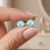Kolczyki damskie sztyfty z pozłacanego srebra z kryształami Swarovski® Light Turquoise