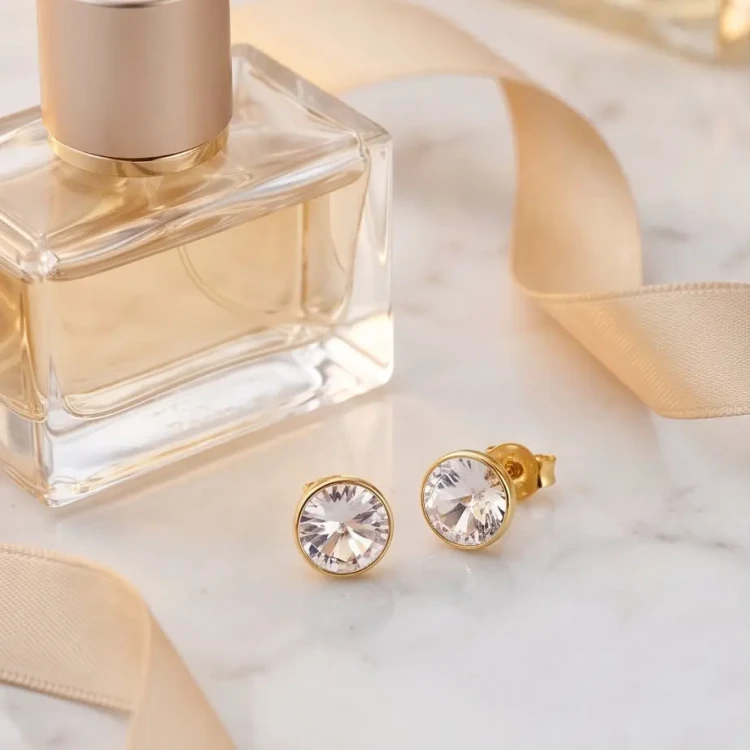 Kolczyki na sztyft z pozłacanego srebra z kryształami Swarovski® w kolorze Crystal